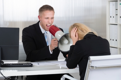 Boss Shouting At Businesswoman Through Loudspeaker In Office